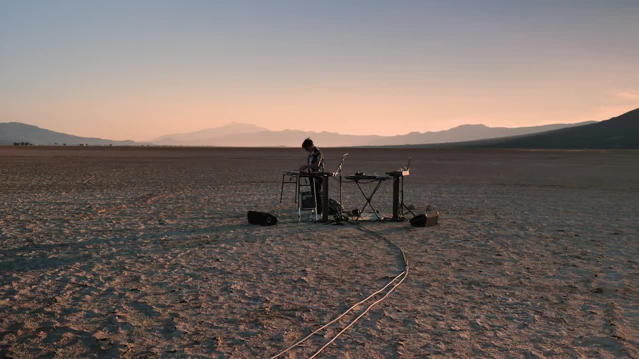 Stock Video Dj Playing Music In The Middle Of A Sunny Desert Live Wallpaper For PC