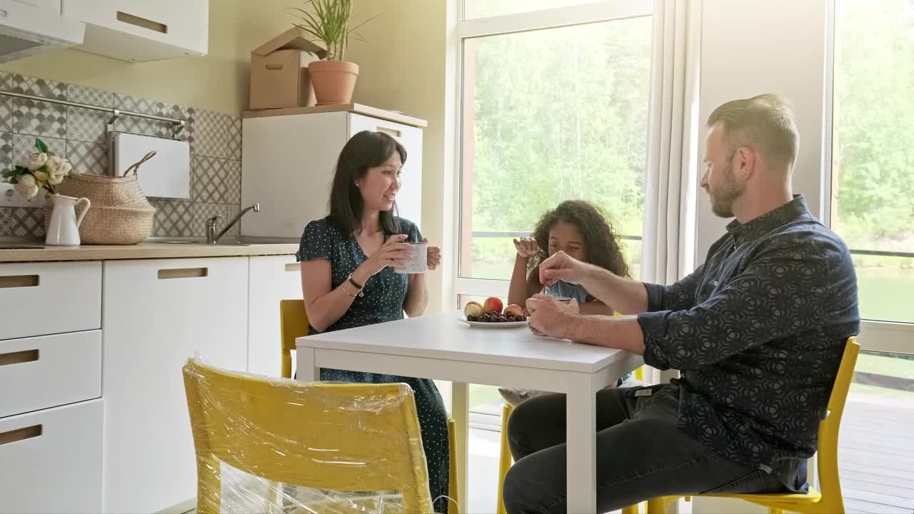 Stock Video Diverse Race Family Sit At Kitchen Table Drinking Coffee Live Wallpaper For PC