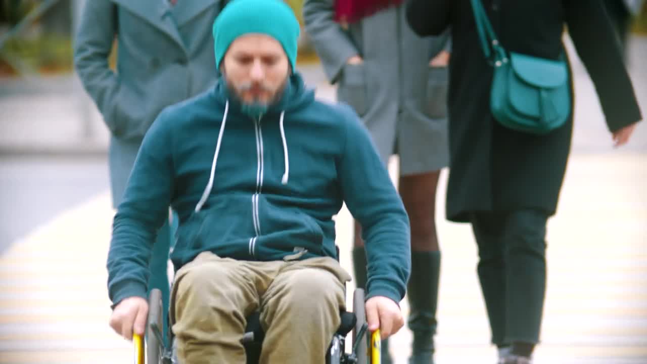 Stock Video Disabled Man In A Wheelchair On The Street Live Wallpaper For PC