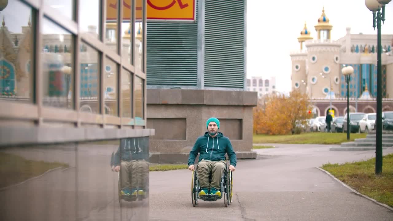 Stock Video Disabled Man In A Wheelchair And A Disabled Sign Live Wallpaper For PC
