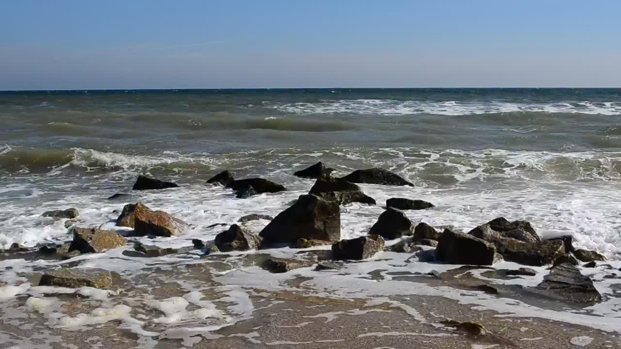 Stock Video Dirty Seawater Breaking Over Rocks Live Wallpaper For PC