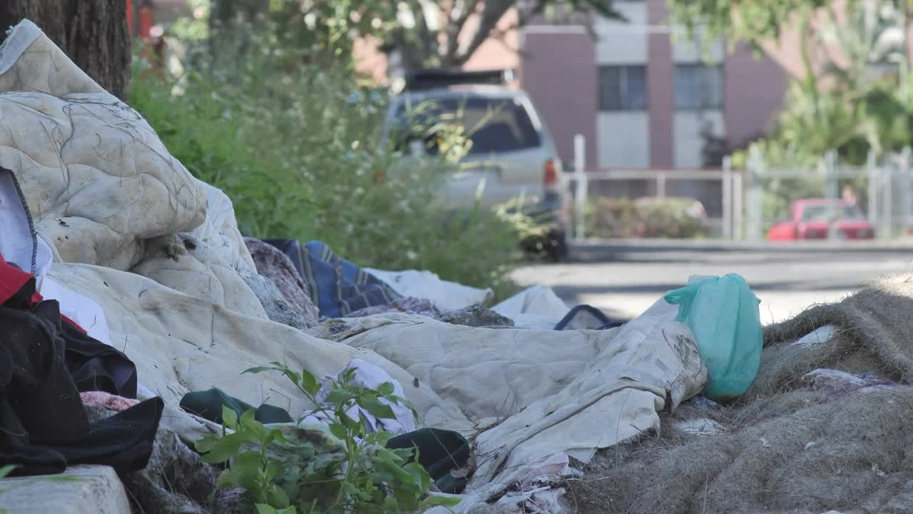 Stock Video Dirty And Damaged Fabrics Thrown In The Street Live Wallpaper For PC