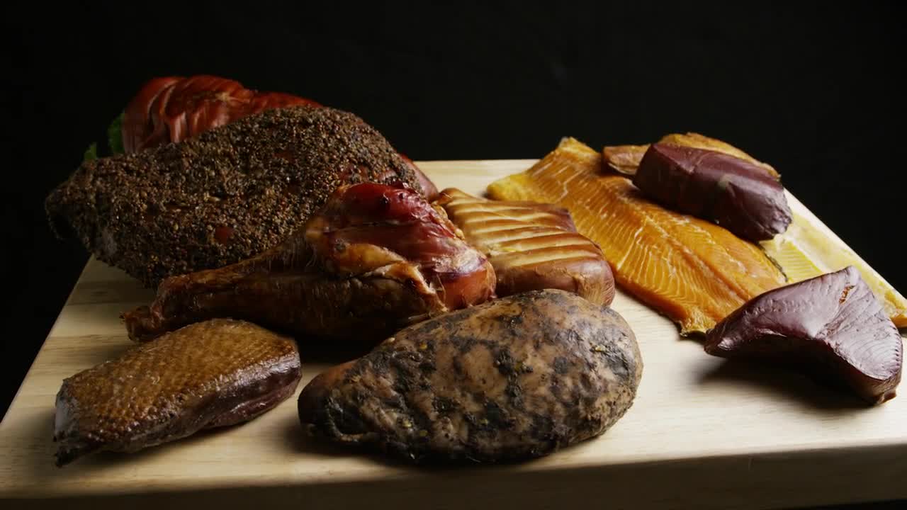 Stock Video Different Types Of Meat Rotating On A Wooden Board Live Wallpaper For PC