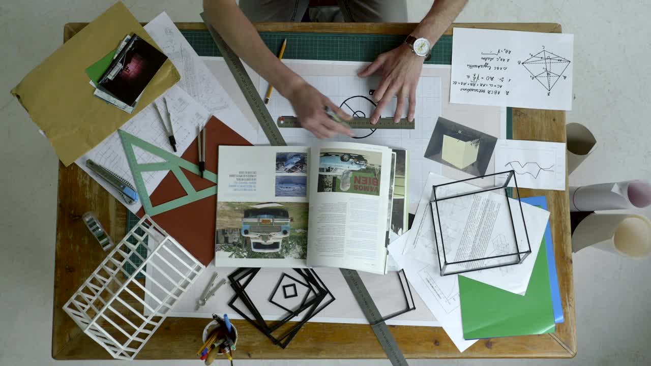 Stock Video Designer Drawing On A Messy Desk Live Wallpaper For PC