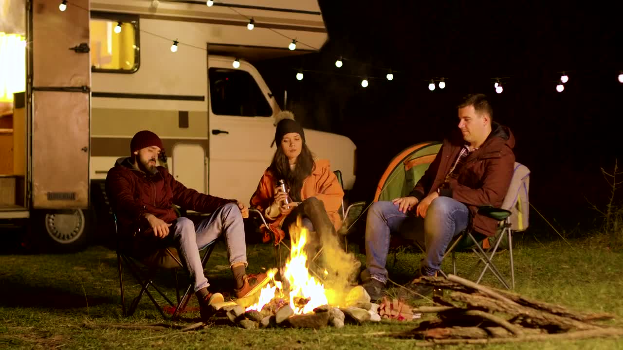 Stock Video Friends Enjoy A Quiet Night Around A Campfire Live Wallpaper For PC