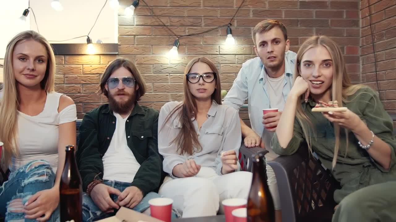 Stock Video Friends Cheer For Win While Watching Tv Competition Live Wallpaper For PC