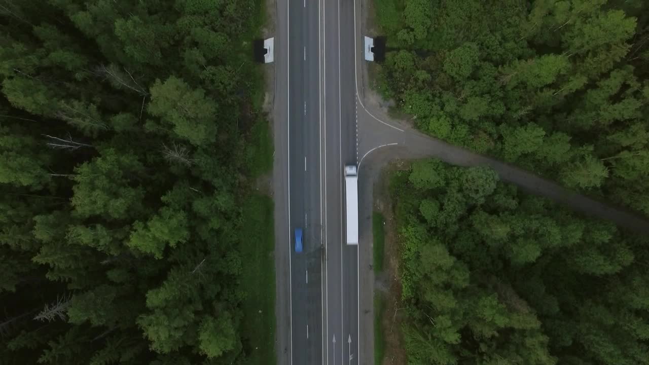 Stock Video Freight Trucks Heading Through A Forest Live Wallpaper For PC