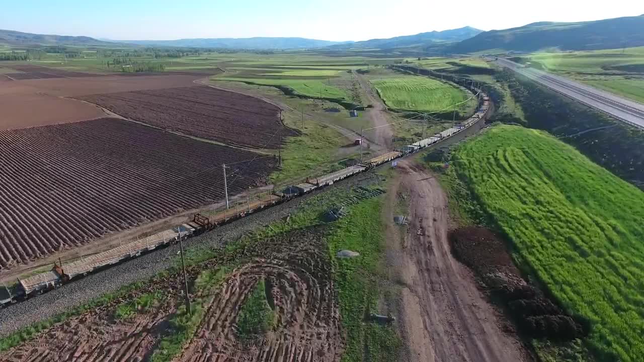 Stock Video Freight Train Moving Through Agricultural Fields Live Wallpaper For PC