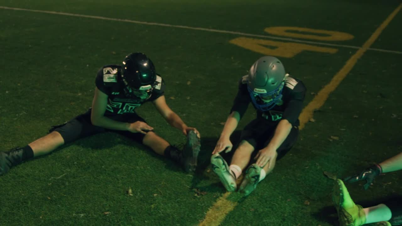 Stock Video Football Team Stretching On A Field Live Wallpaper For PC
