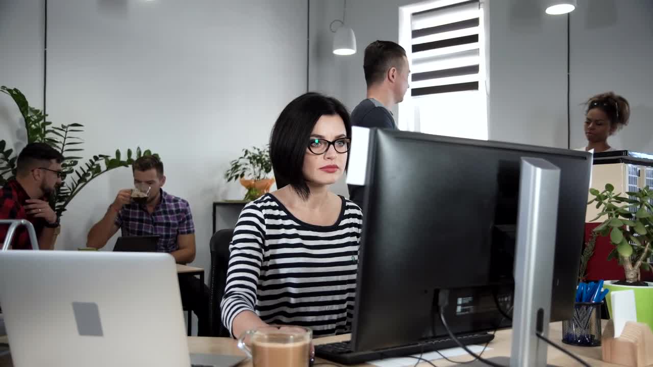 Stock Video Focused Woman Working On The Computer Live Wallpaper For PC