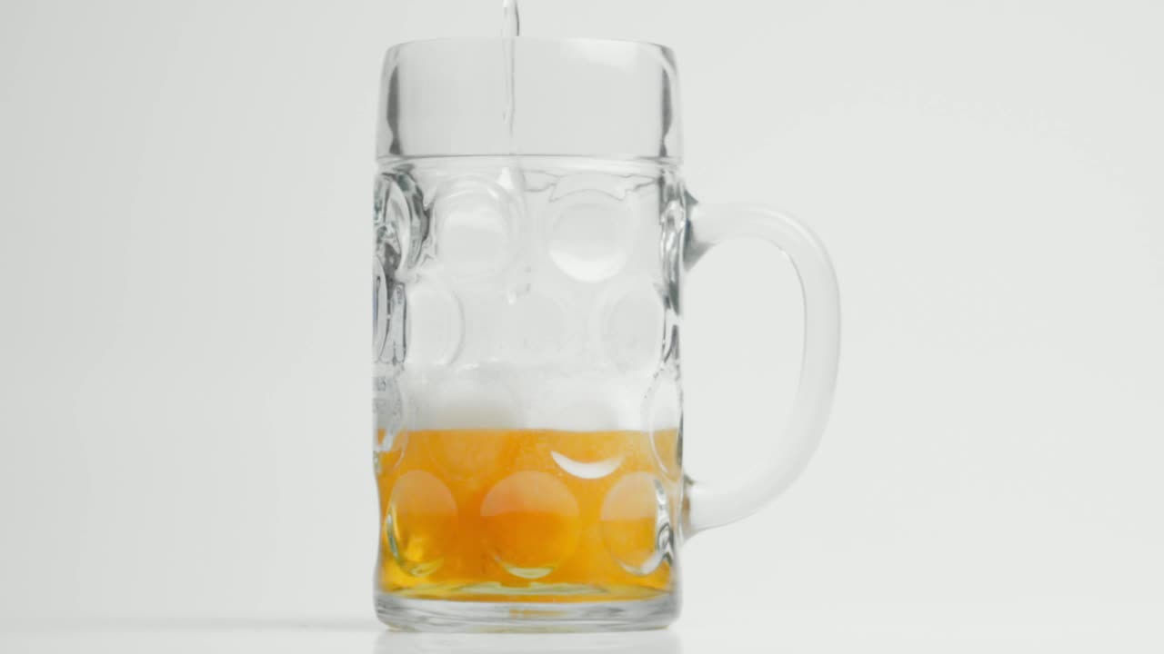 Stock Video Foaming Beer Being Poured Into A Glass Live Wallpaper For PC