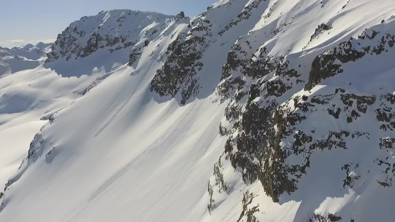 Stock Video Flying Through A Snowy Mountain With Rocks Live Wallpaper For PC