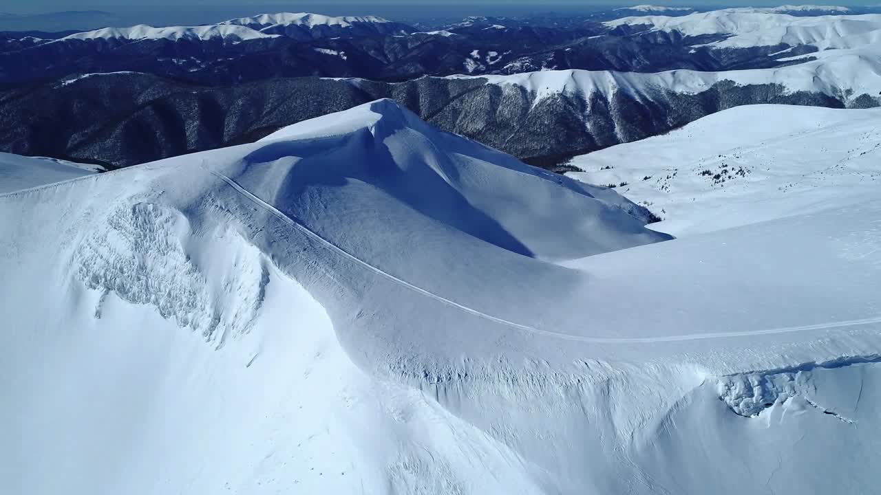 Stock Video Flying Slowly Over A Snowy Mountain Range Live Wallpaper For PC