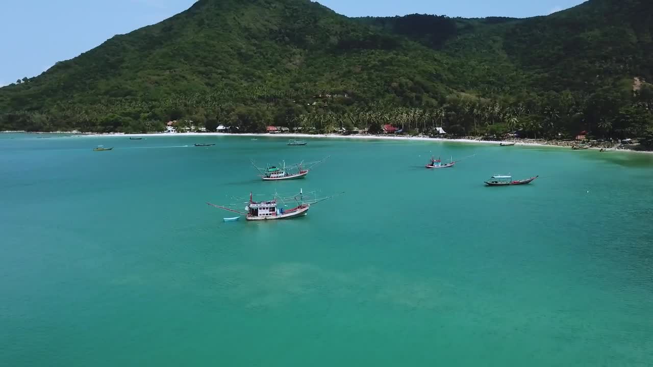 Stock Video Flying Over The Water Of A Beach With Many Boats Live Wallpaper For PC