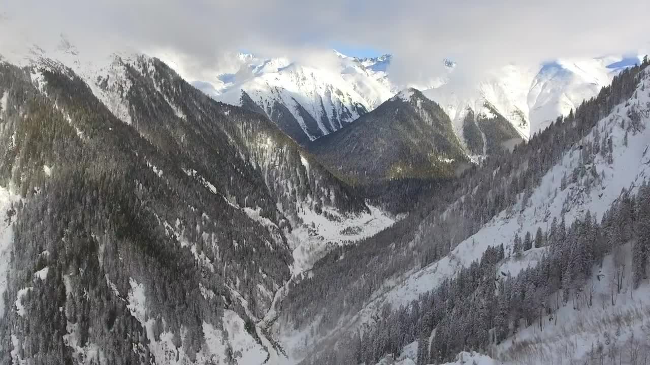 Stock Video Flying Over The Snowy Mountains Live Wallpaper For PC