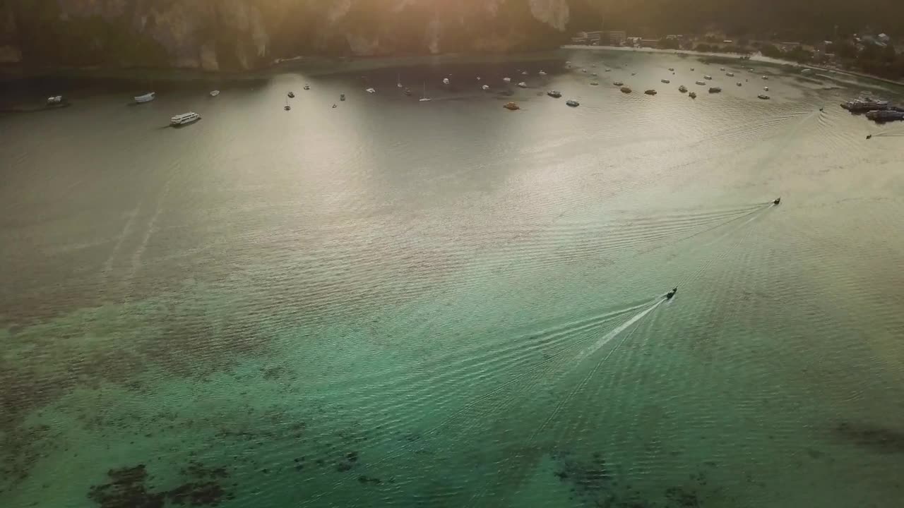 Stock Video Flying Over The Clear Sea Of A Coast In A Live Wallpaper For PC