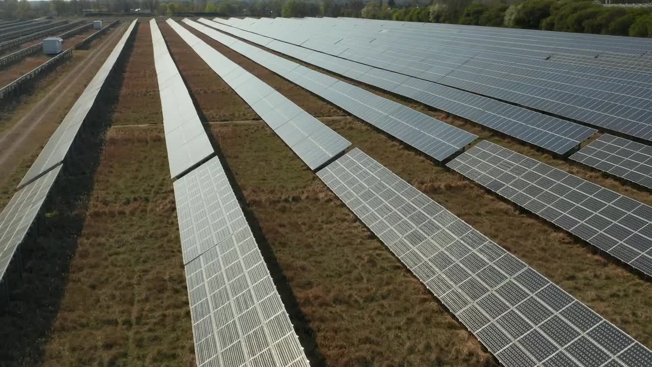 Stock Video Flying Over Long Rows Of Solar Panels Live Wallpaper For PC