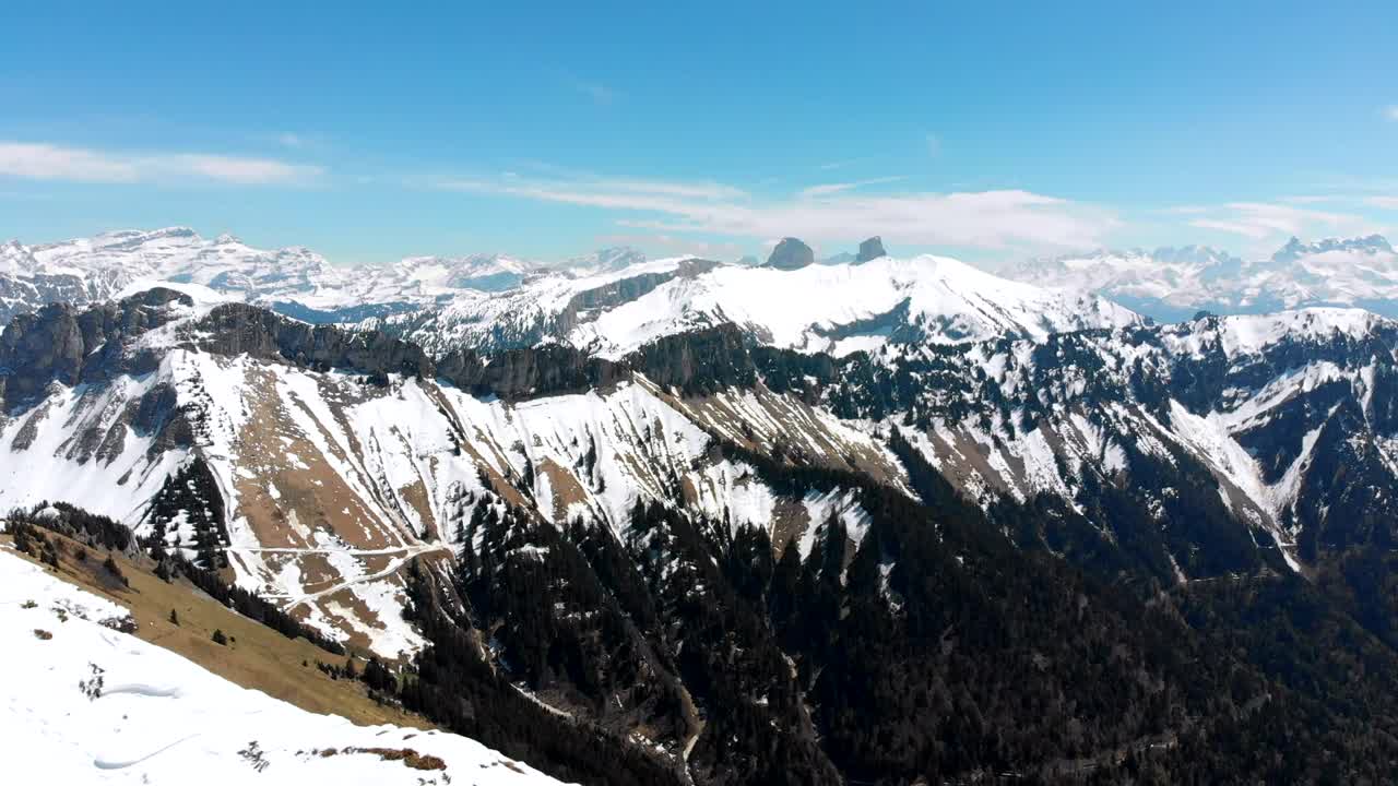 Stock Video Flying Over A Snowy Mountain Peak Live Wallpaper For PC