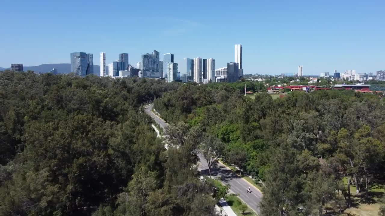 Stock Video Flying Over A Natural Area Of A Big City Live Wallpaper For PC