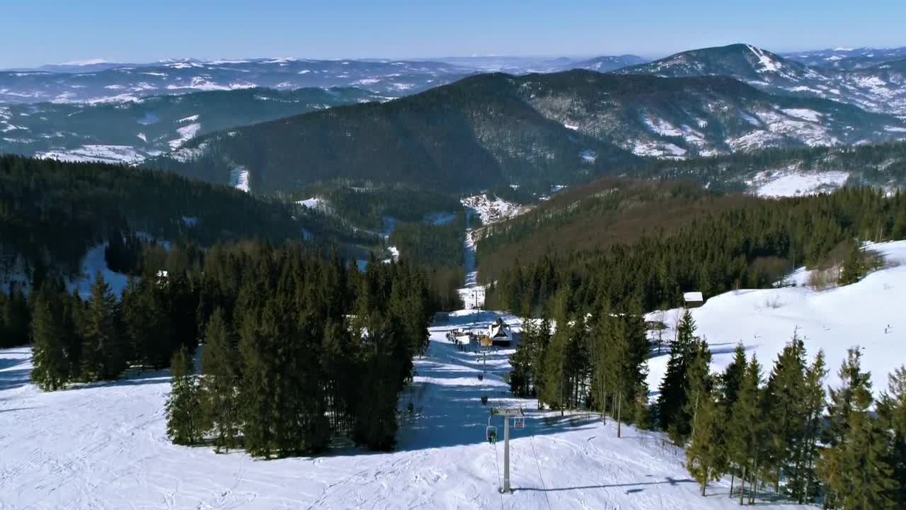 Stock Video Flying Over A Mountainous Forest In Winter Live Wallpaper For PC