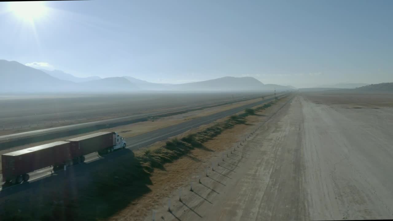 Stock Video Flying Over A Long Highway With Cars And Trucks Live Wallpaper For PC