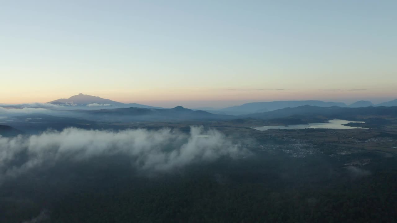 Stock Video Flying Over A Landscape With Mountains During Sunset Live Wallpaper For PC