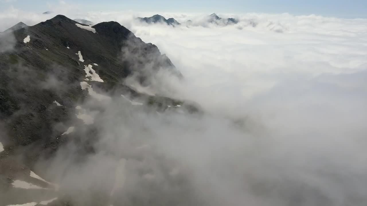 Stock Video Flying Over A Cloudy Mountain Range Live Wallpaper For PC
