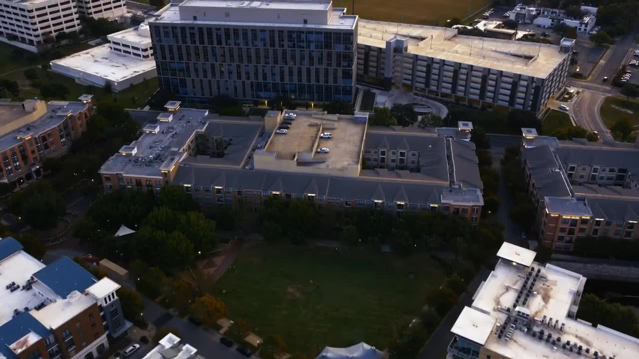 Stock Video Flying Over A City With Buildings And A Huge Park Live Wallpaper For PC
