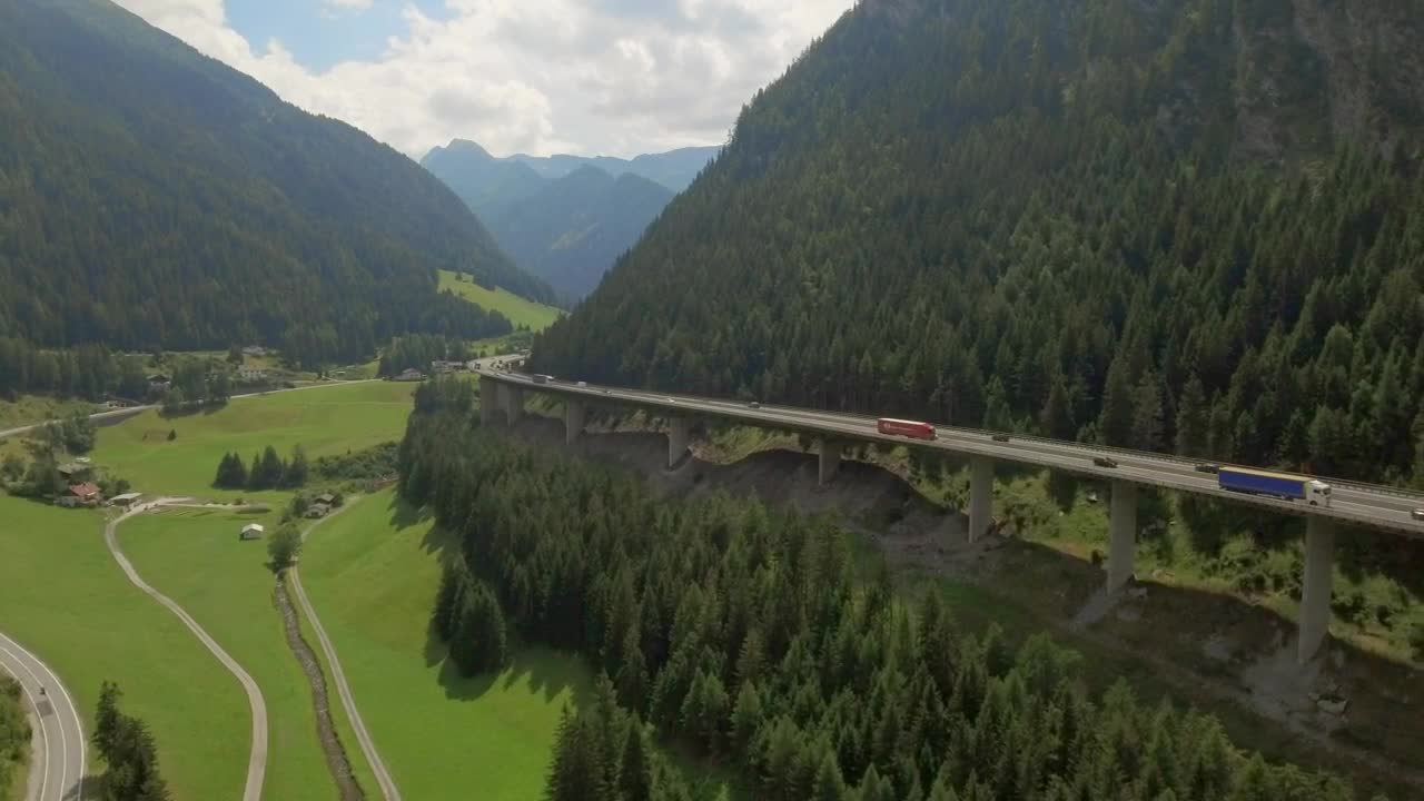 Stock Video Flying Along Mountain Highway In Forested Valley Live Wallpaper For PC