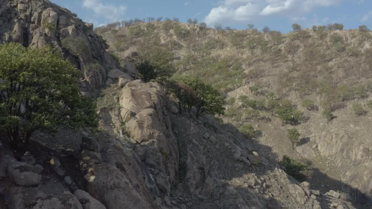 Stock Video Fly Over A Mountain Range In An Arid Environment Live Wallpaper For PC