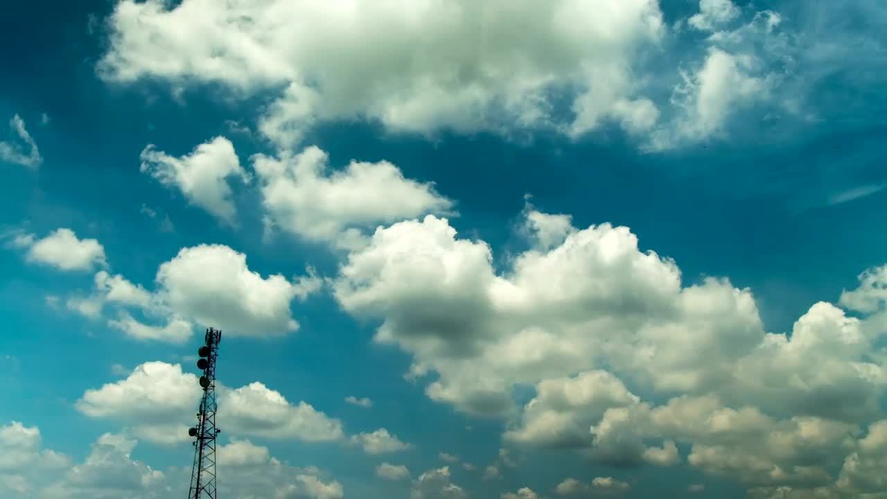 Stock Video Fluffy Clouds Over A Broadcast Tower Live Wallpaper For PC