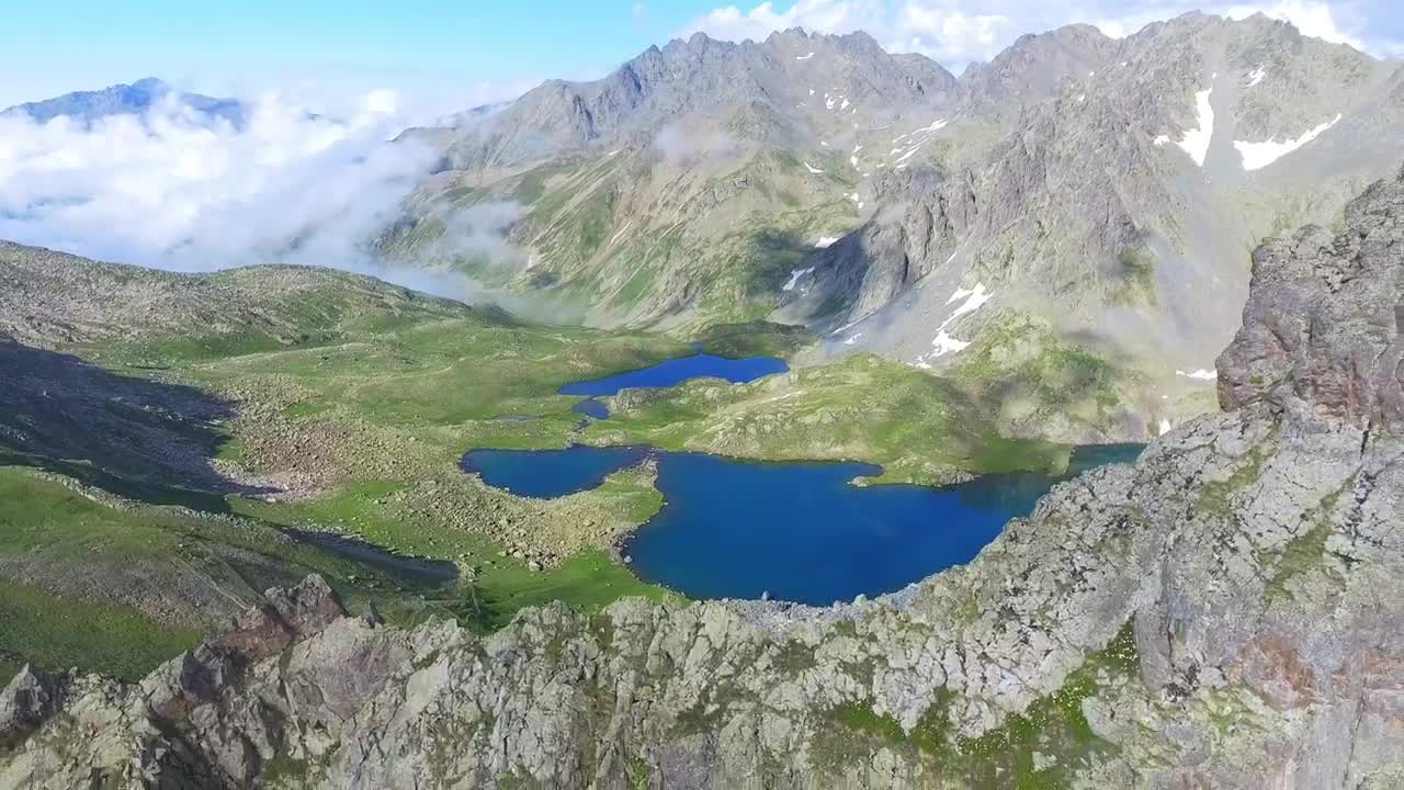 Stock Video Flight In The Rocky Mountains And A Valley With A Live Wallpaper For PC