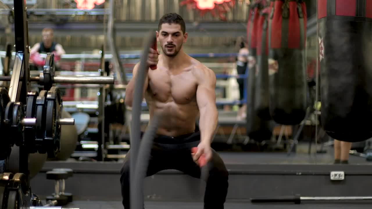 Stock Video Fitness Man Working Out With Ropes Live Wallpaper For PC