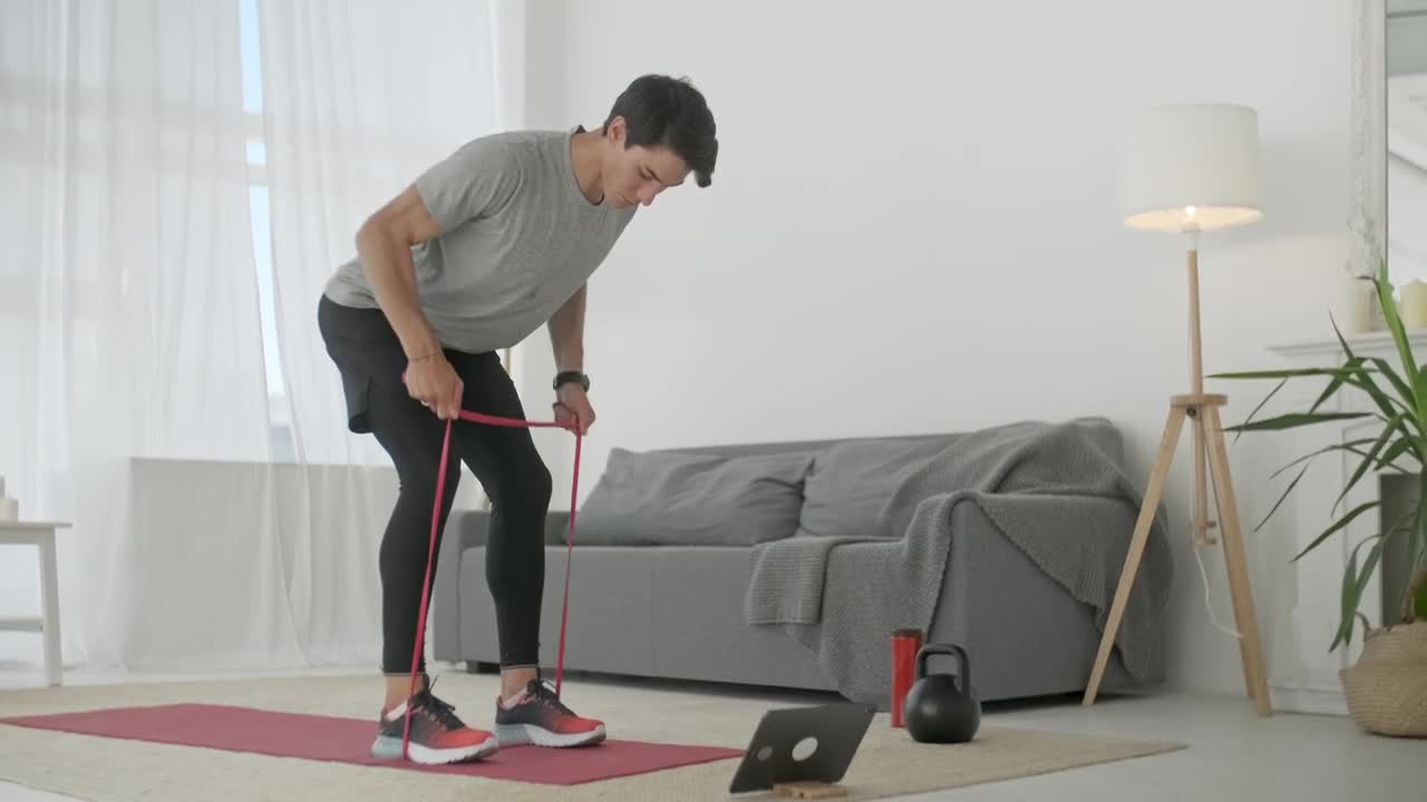 Stock Video Fitness Man Exercising With Elastic Bands Live Wallpaper For PC