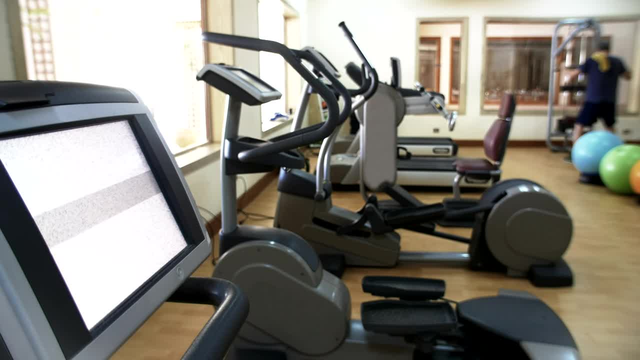 Stock Video Fitness Machines With A Single Man Working Out Live Wallpaper For PC