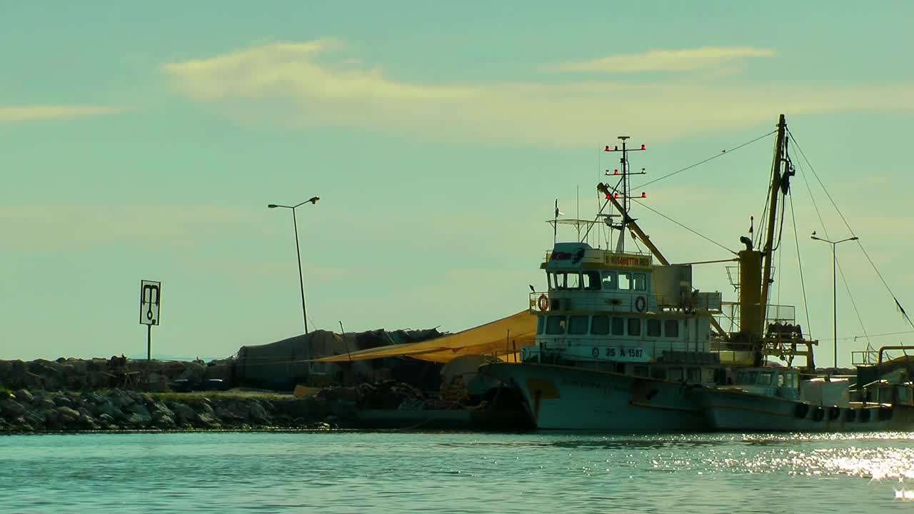 Stock Video Fishing Boat Anchored On The Coast Live Wallpaper For PC