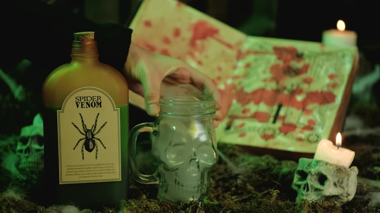 Stock Video Filling A Skull Shaped Glass With Spider Venom Live Wallpaper For PC