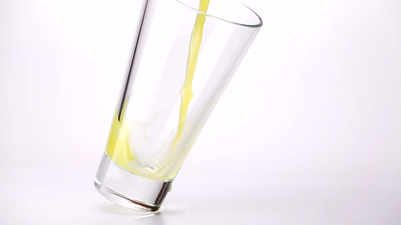 Stock Video Filling A Glass With Juice On A White Background Live Wallpaper For PC