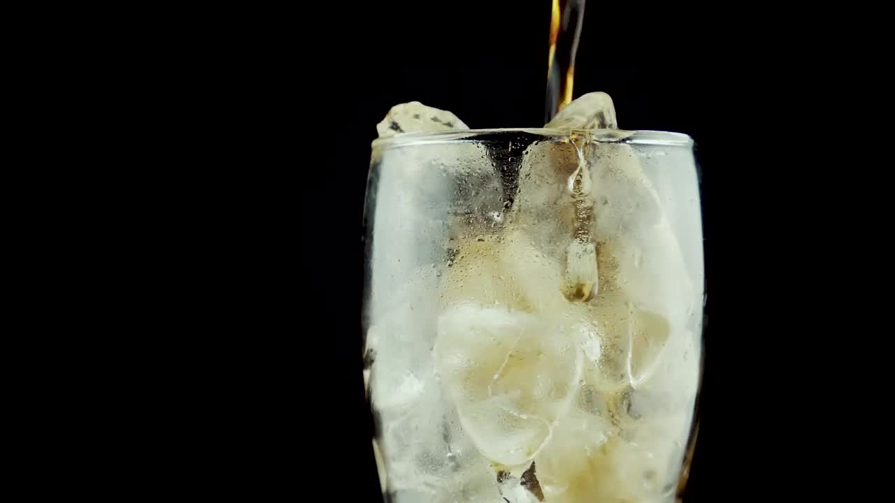 Stock Video Filling A Glass With Ice And Soda On A Dark Live Wallpaper For PC