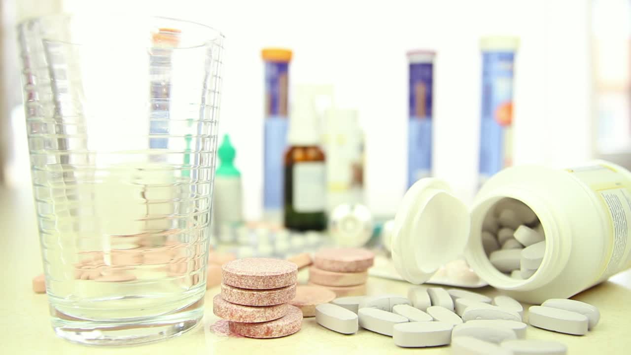 Stock Video Filling A Glass Surrounded By Many Drugs Live Wallpaper For PC