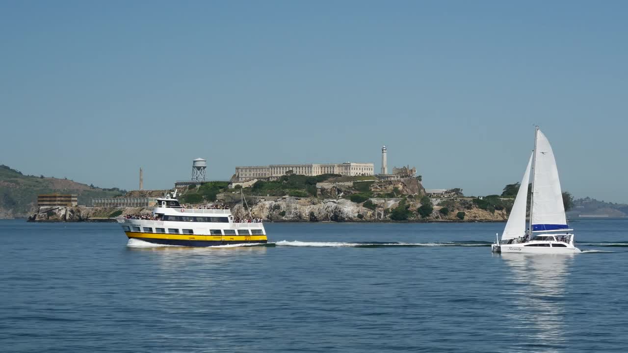 Stock Video Ferry And Sailboat Passing By Alcatraz Island In San Francisco Live Wallpaper For PC