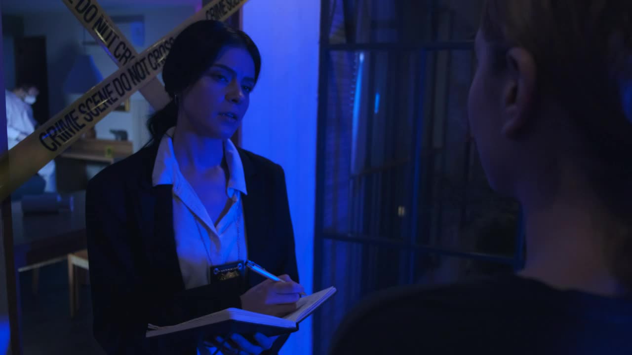 Stock Video Female Police Officer Interrogating A Person At A Crime Scene Live Wallpaper For PC