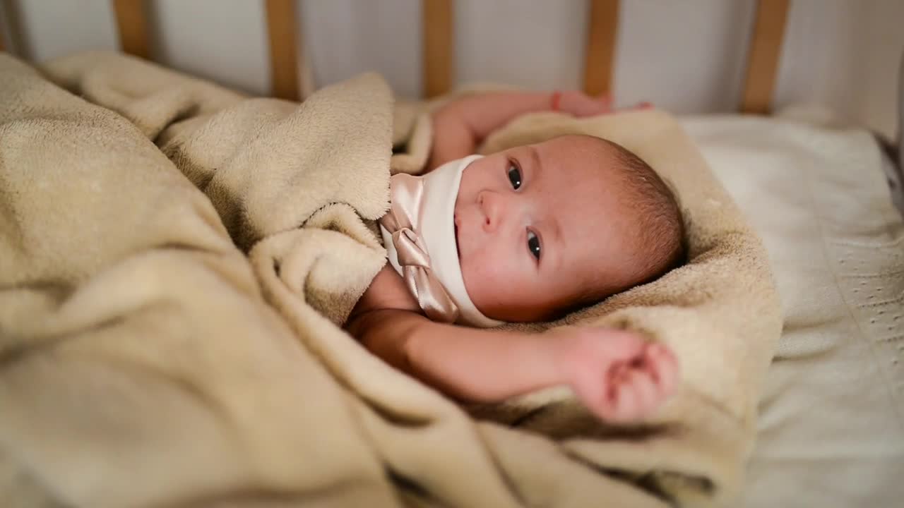 Stock Video Female Newborn Baby Lying In Her Crib Live Wallpaper For PC