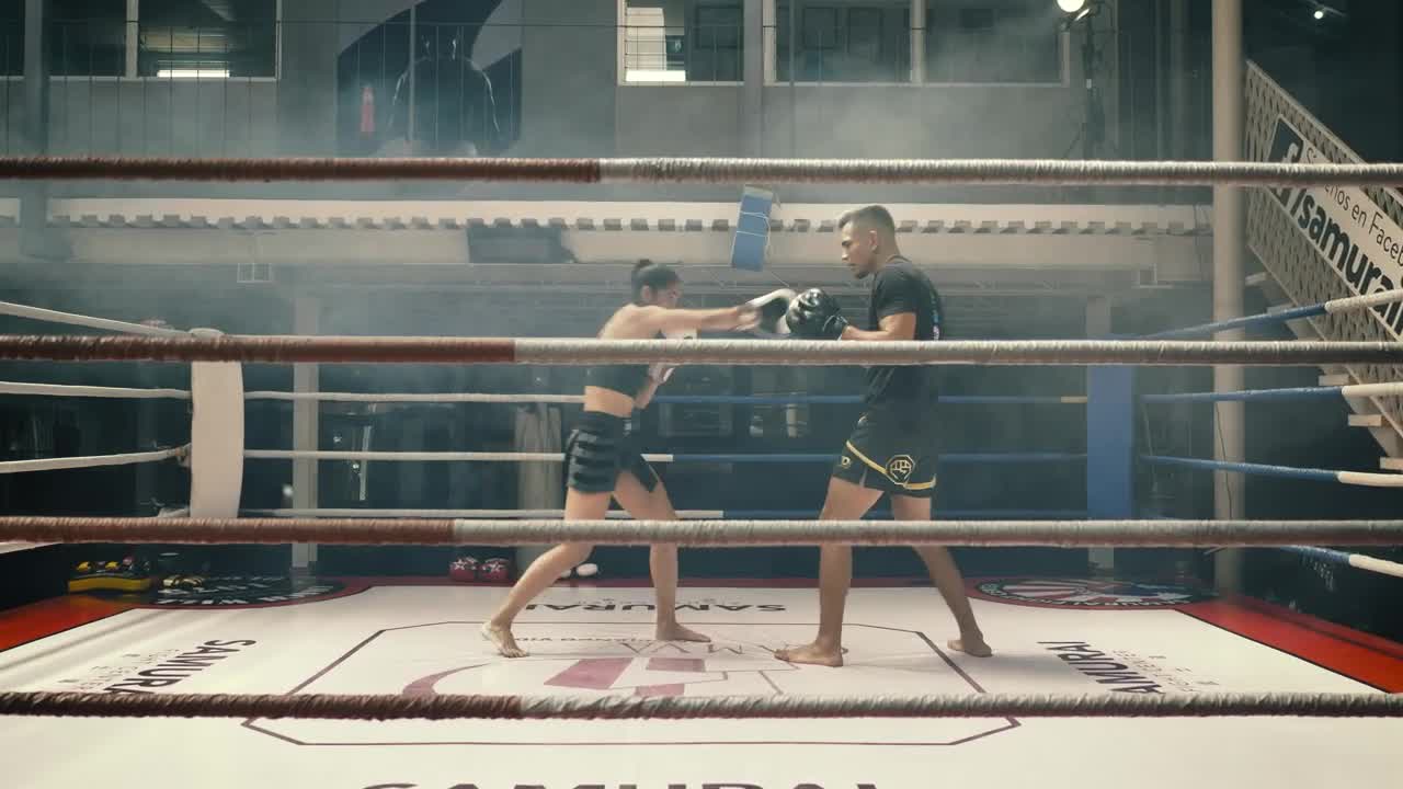 Stock Video Female Kickboxer Training With Her Coach Live Wallpaper For PC