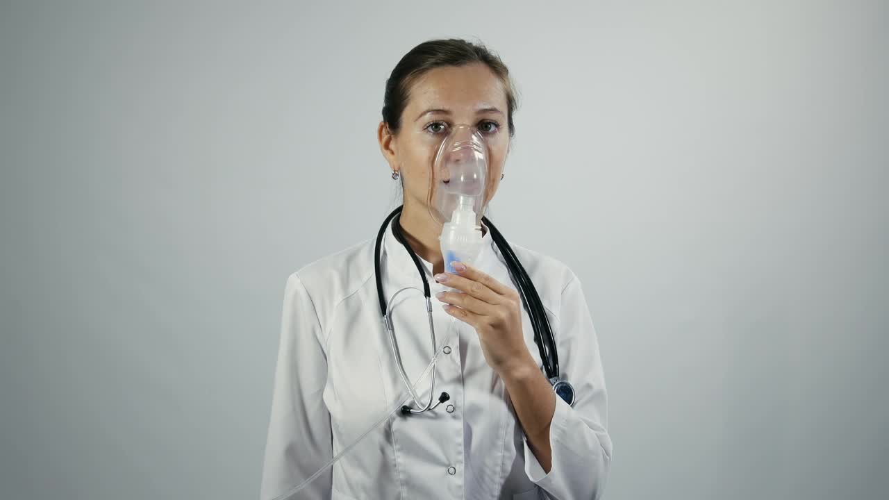 Stock Video Female Doctor Using Inhalator Device Live Wallpaper For PC