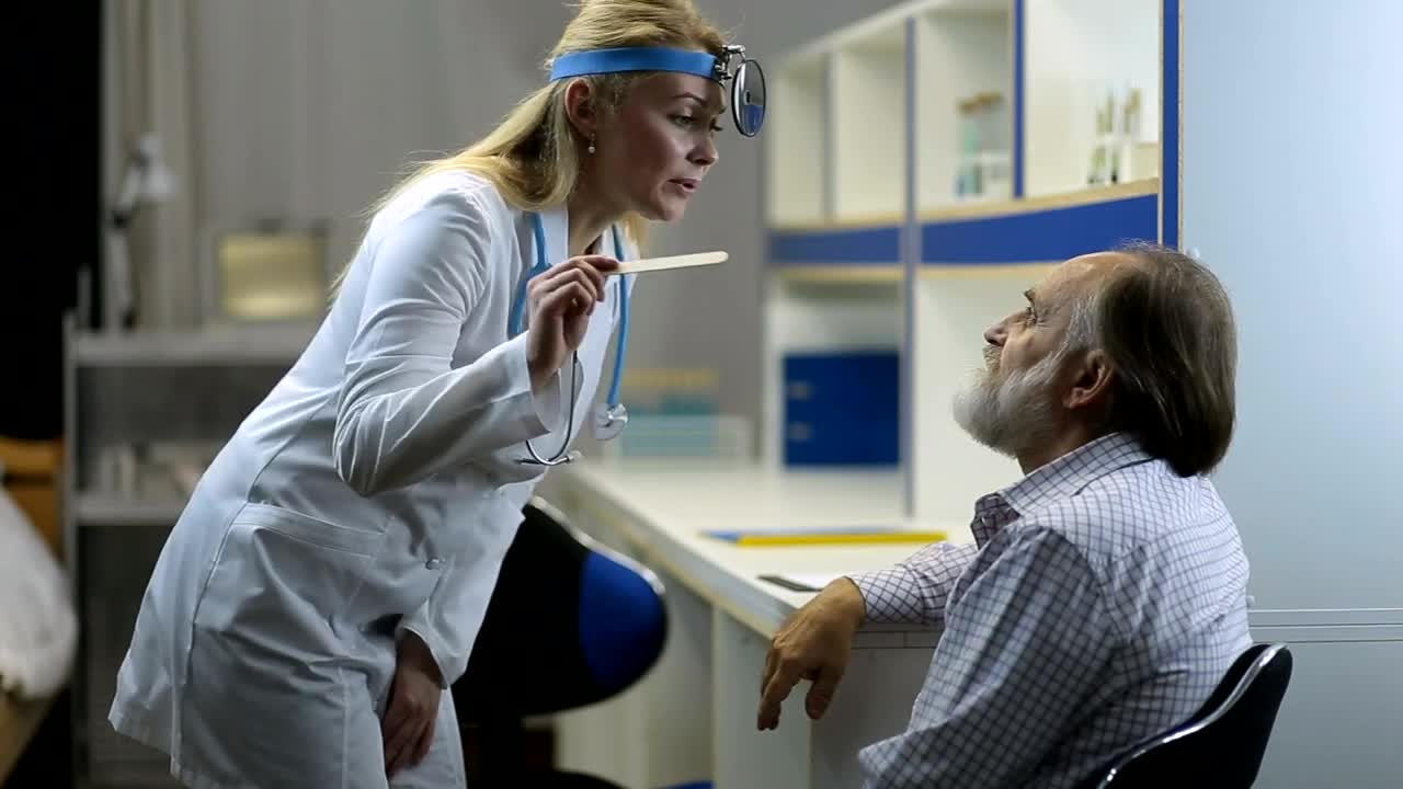Stock Video Female Doctor Doing A Medical Checkup To A Man Live Wallpaper For PC