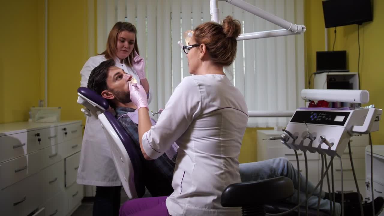 Stock Video Female Dentist Polishing Teeth Live Wallpaper For PC