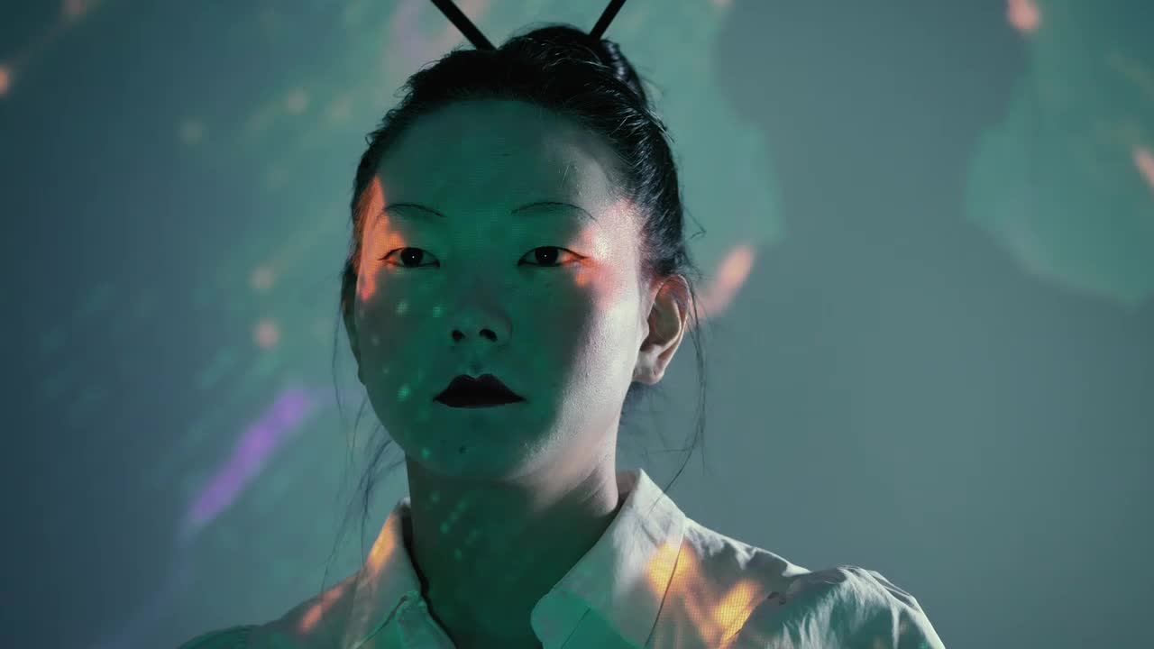 Stock Video Female Cyborg Raising Hand And Looking At The Camera Live Wallpaper For PC