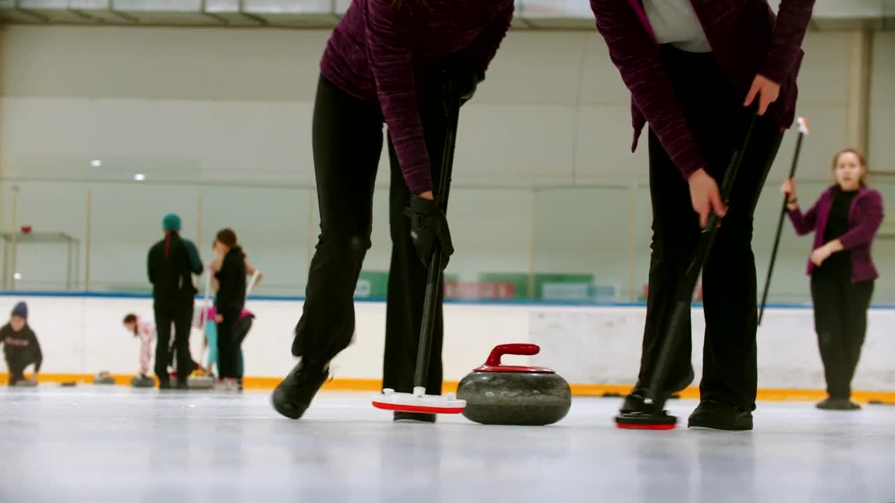 Stock Video Female Curling Players In A Shot Close To The Ice Live Wallpaper For PC