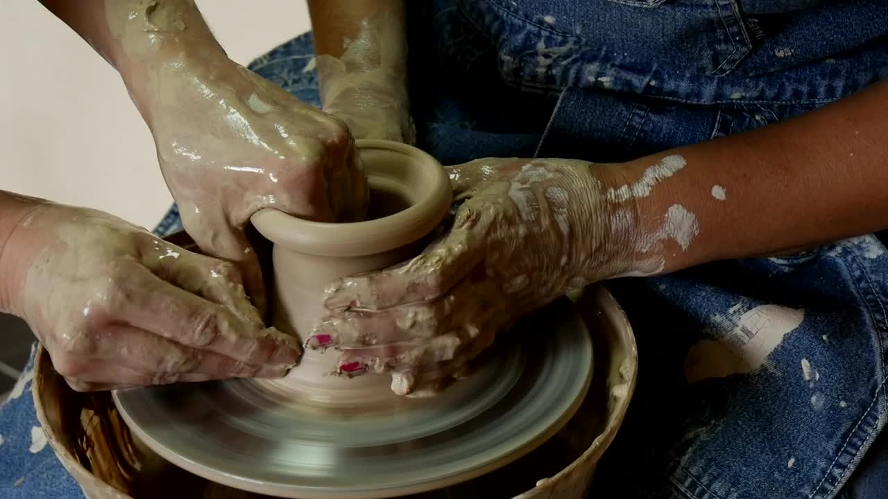 Stock Video Female And Male Hands Working Together On Raw Clay Live Wallpaper For PC